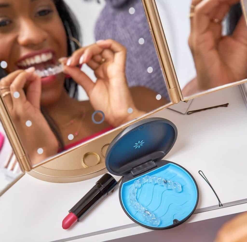 Invisalign Richmond: The Ultimate Guide to Invisible Braces 6 Happy Girl Putting on Invisalign