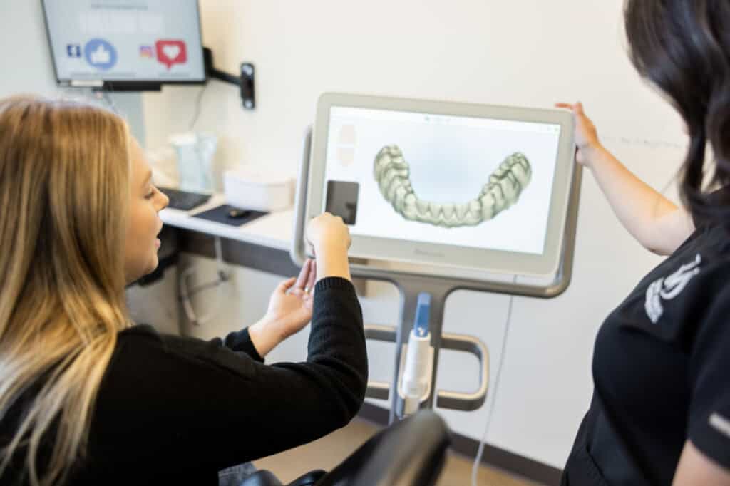 Invisalign Richmond, VA 5 Patient viewing a 3D Invisalign scan at Richmond Virginia Orthodontics